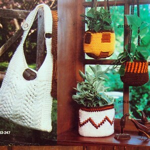 May include: A set of crocheted home decor items, including a white tote bag, three hanging plant pots in brown, orange, and yellow, two orange and yellow pot holders, and a brown, orange, and white striped rug with fringe.