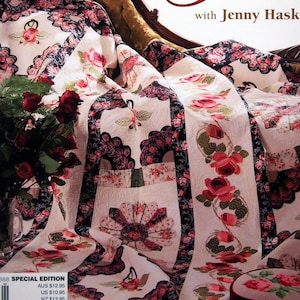 May include: The cover of a quilting book titled "The Margin for Error Quilt" by Jenny Haskins. The cover features a floral quilt with a white background and black, pink, and green accents. The quilt is draped over a brown chaise lounge.