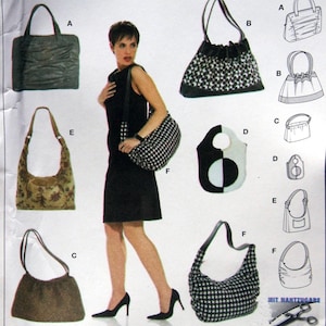 Peut inclure: Un patron de couture Burda pour réaliser six sacs différents. Le patron comprend des instructions pour un sac à carreaux noir et blanc, un sac géométrique noir et blanc, un sac marron, un sac floral vert et marron, un sac gris et un sac noir. Le patron comprend également des instructions pour réaliser une robe.