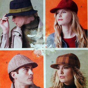 May include: McCall's Fashion Accessories pattern featuring four different hat styles. The hats include a navy fedora with a gold band, a red baseball cap, a tweed newsboy cap, and a plaid cap with a brim.