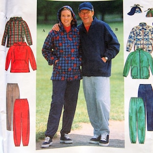 May include: Simplicity sewing pattern 7854 for sizes L and XL. The envelope features illustrations of hooded jackets, pullovers, and trousers in various colours and patterns, including plaid, solid red, green, and blue, plus a blue baseball cap.