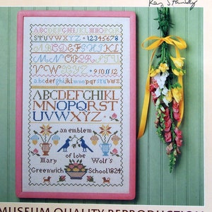 Mary Wolf Sampler - 1824 - Antiker Sampler von McCall's Heritage Collection Vintage Kreuzstichmuster Leaflet 1984