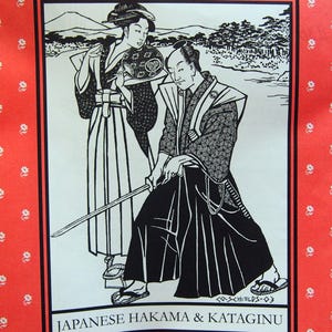May include: A Folkwear pattern envelope 151 for Japanese Hakama & Kataginu. The orange paper features a repeating white floral pattern. A black and white illustration shows two figures in traditional attire, one holding a sword and one a fan.