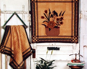 Een verzameling steken van Lynne Hagmeier en Kansas Troubles Quilters Vintage quilt- en naaipatroonboekje 2001