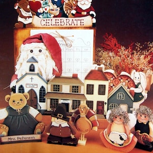 May include: A collection of wooden painted figurines, including a Father Christmas, a turkey, a pilgrim, a church, and a house. The figurines are all painted in bright colours and have a whimsical, folk art style. The title "Celebrate with Best Friends" is written in gold lettering at the top of the image. The image is from a book titled "Jackie Shaw Studio Publication #61".