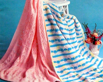 May include: A white wicker high chair draped with two baby blankets. One blanket is a solid pink with a diamond pattern, and the other is striped in blue, yellow, and white. A small vase of flowers sits nearby. The image has the numbers 2637-258 and 2635-258.