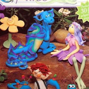 May include: A book titled "Clay Characters for Kids" with a colorful cover featuring a blue dragon, a fairy with purple wings, a red-haired gnome, and a green lizard. The book includes 30 fun polymer clay projects.