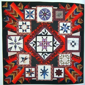 May include: A quilt with a central star design in shades of purple, red, and white. The quilt is surrounded by smaller squares with various star patterns in blue, red, and white. The quilt is made with a variety of fabrics and textures.