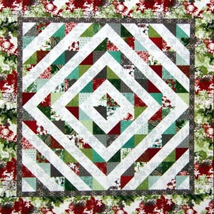 May include: A square quilt with a central diamond pattern in red, green, white, and grey. The design features diagonal lines and small square blocks. The border has a floral pattern in red and green.