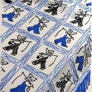 May include: A vintage textile featuring a repeating pattern of cartoon figures in blue overalls and patterned outfits, each holding a bucket and a stick. The figures are set against a white background with blue grid lines and borders.