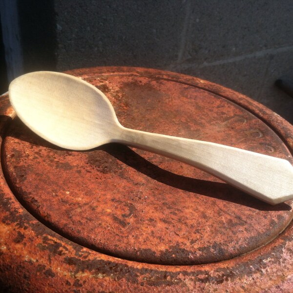 Hand carved eating spoon