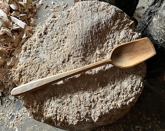 Hand carved wooden cooking spoon