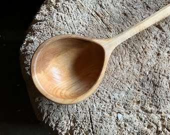 Hand carved wooden serving ladle