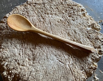 Hand carved wooden eating spoon