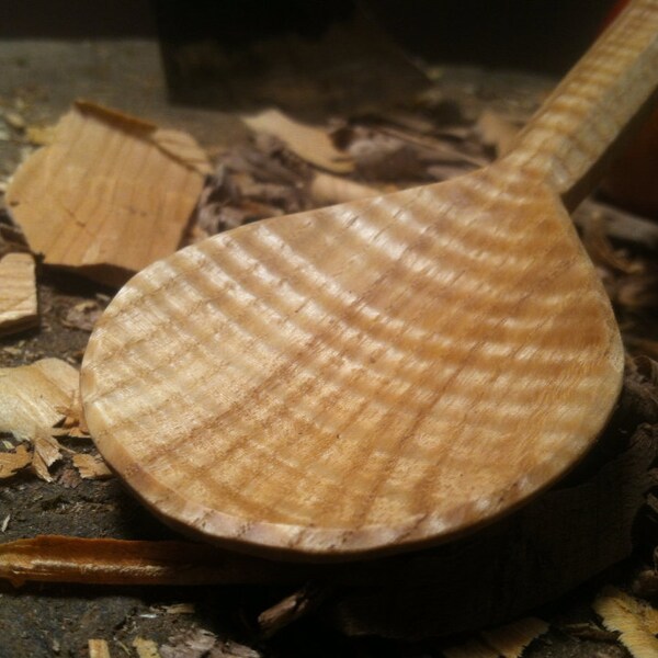 Hand carved curly ash cooking spoon