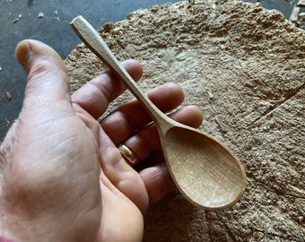 Hand carved eating spoon