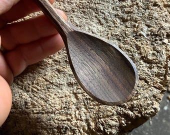 Hand carved wooden cooking and eating spoon