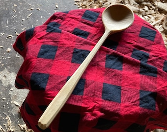 Hand carved cooking spoon
