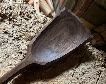 Hand carved wooden cooking spoon, twelve eleven inches long
