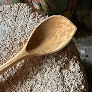 Hand carved wooden cooking spoon