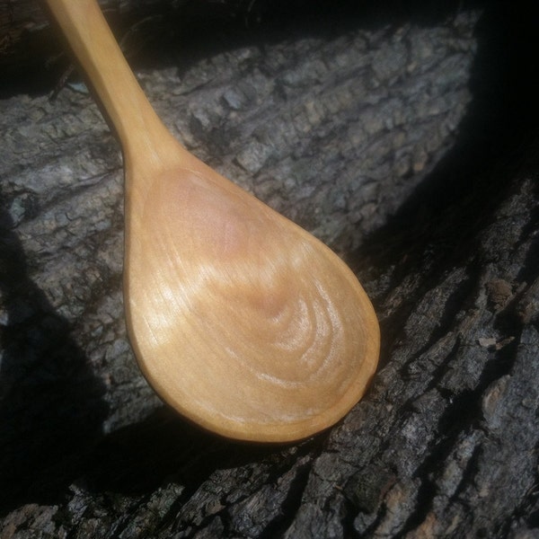 Hand carved wooden cooking spoon