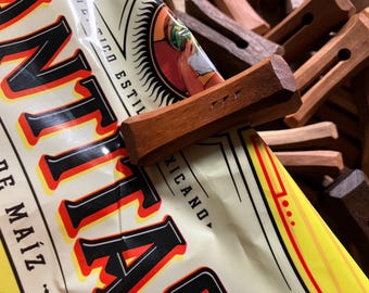 Hand carved wooden chip clips, bag clips