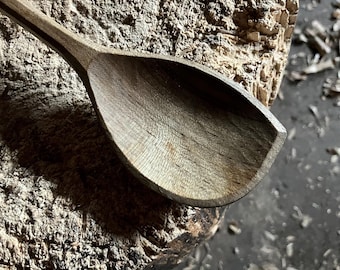 Hand carved left handed wooden cooking spoon