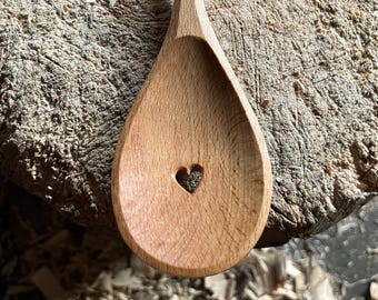 Hand carved wooden cooking spoon