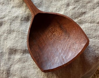 Hand carved wooden serving spoon