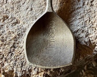 Hand carved wooden serving spoon