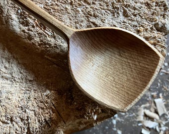 Hand carved wooden serving spoon
