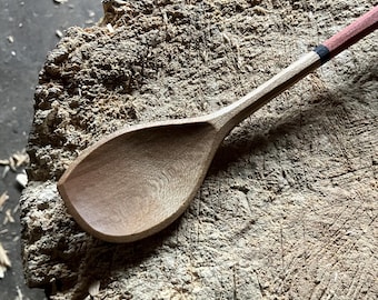 Hand carved wooden cooking and eating spoon
