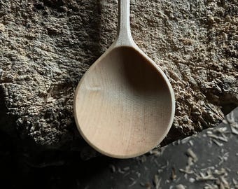 Hand carved wooden serving spoon