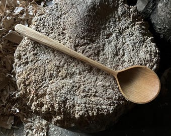 Hand carved wooden cooking spoon