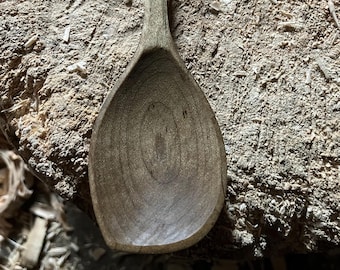 Hand carved right handed wooden cooking spoon, ten inches long