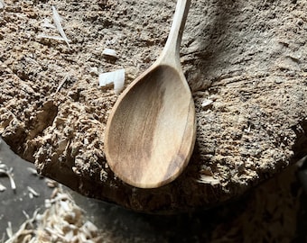 Hand carved wooden cooking and eating spoon, nine inches long