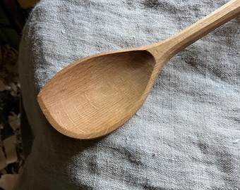 Hand carved cooking spoon
