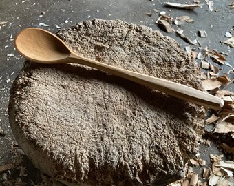 Hand carved wooden cooking spoon