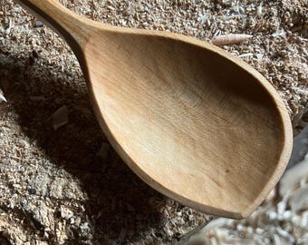 Hand carved cooking spoon