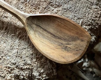 Hand carved left handed wooden cooking spoon, eleven inches long