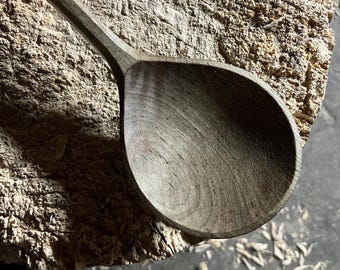 Hand carved wooden serving spoon