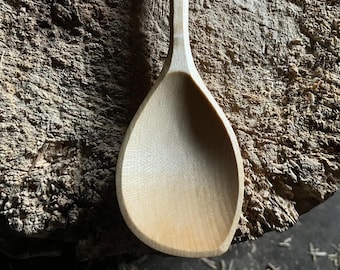 Hand carved left handed wooden cooking spoon