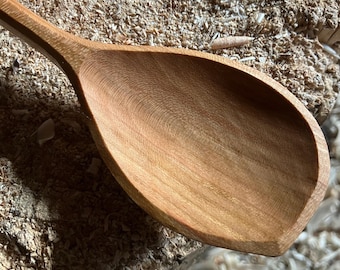 Hand carved cooking spoon