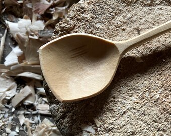 Hand carved wooden cooking spoon