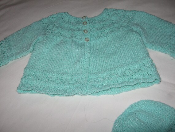 mint green sweater