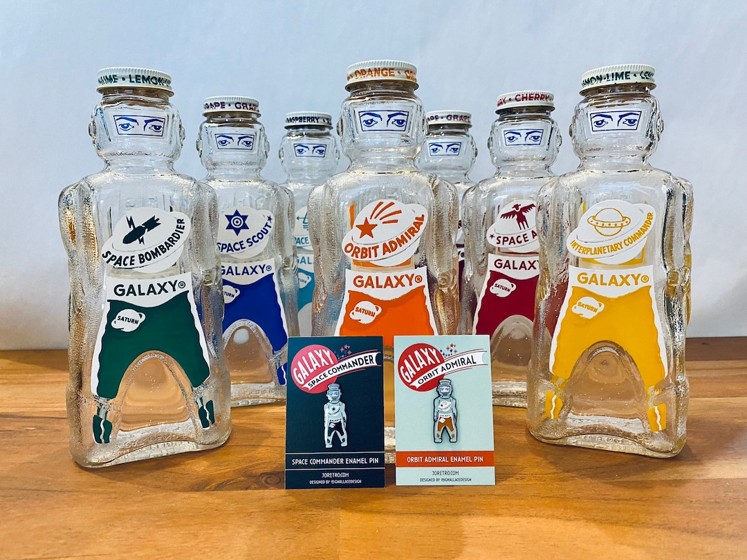 Galaxy Spaceman Syrup Bottle Enamel Pin - 2 Colors - Orange Orbit