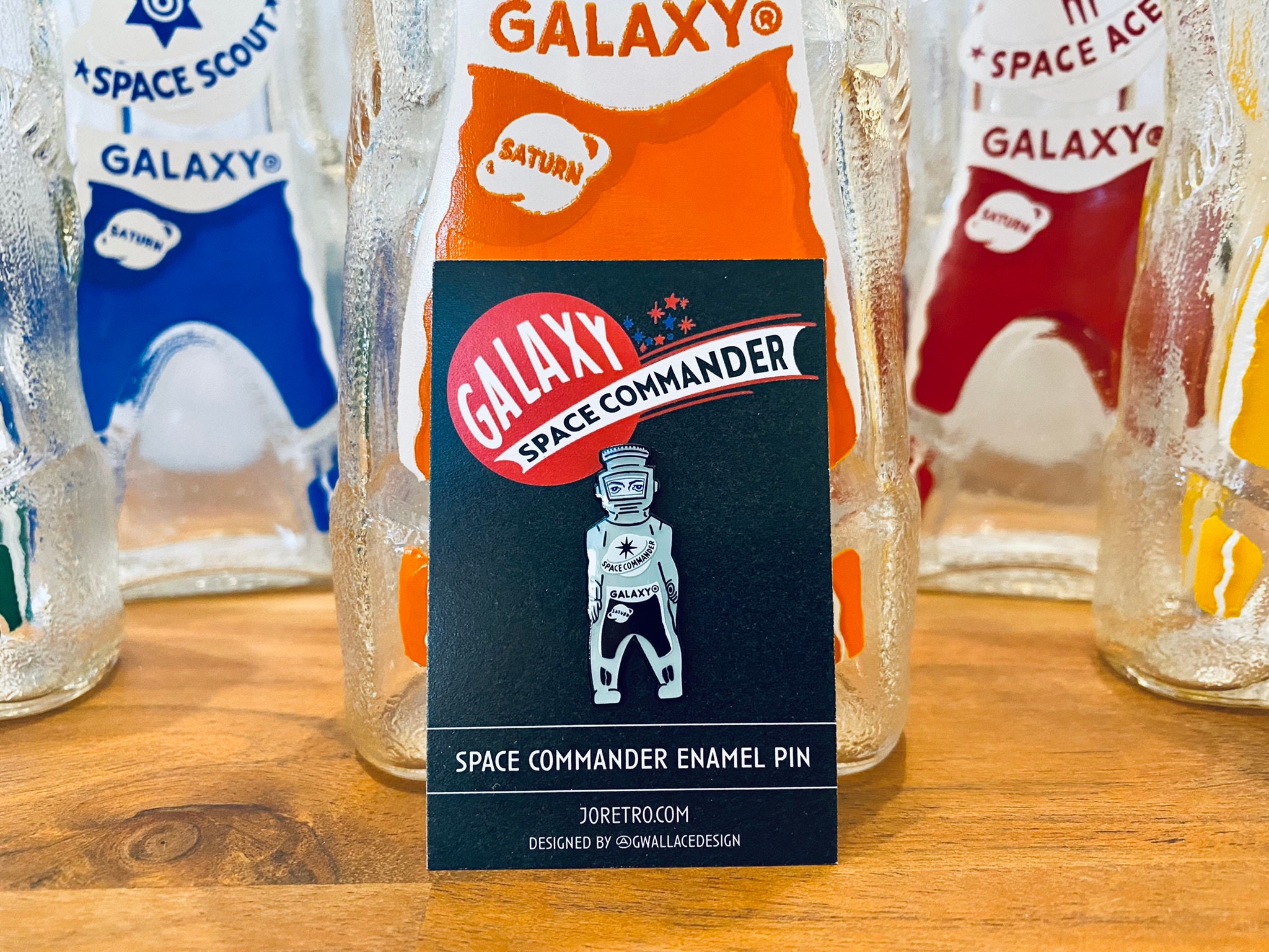 Galaxy Spaceman Syrup Bottle Enamel Pin - 2 Colors - Orange Orbit
