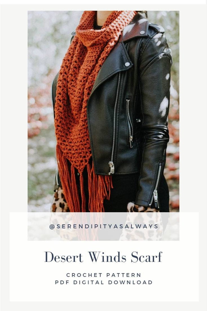 May include: A close-up of a crocheted scarf in a burnt orange color with fringe. The scarf is worn by a person wearing a black leather jacket and a leopard print shirt. The text "@serendipityasalways" and "Desert Winds Scarf" is visible below the image. The text "Crochet Pattern PDF Digital Download" is visible below the scarf name.