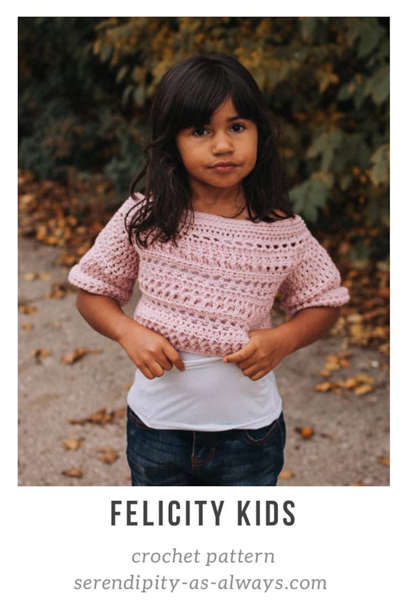 May include: A pink crochet top with a slightly off-the-shoulder neckline. The top has a delicate stitch pattern and short sleeves. The text "FELICITY KIDS crochet pattern" and "serendipity-as-always.com" is visible at the bottom of the image.