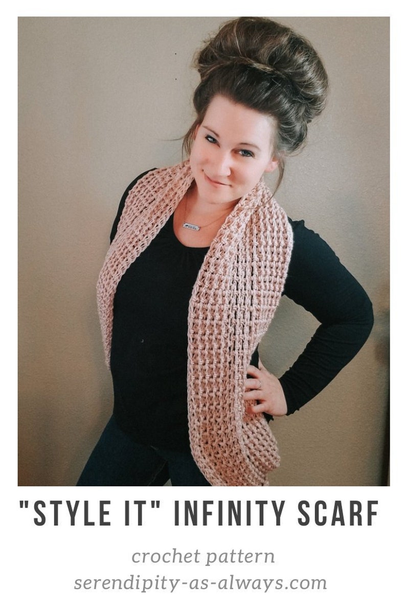 May include: A woman wearing a pink infinity scarf with a black shirt and blue jeans. The scarf is crocheted and has a loose, open weave. The text "STYLE IT" INFINITY SCARF crochet pattern  serendipity-as-always.com is visible below the image.